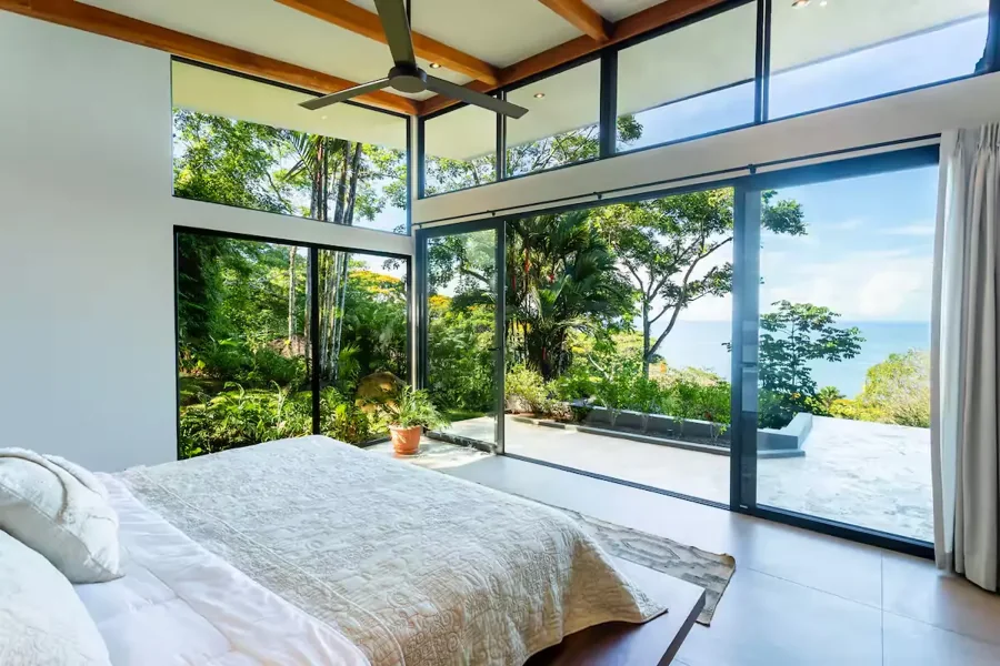 A bedroom overlooking the green hills