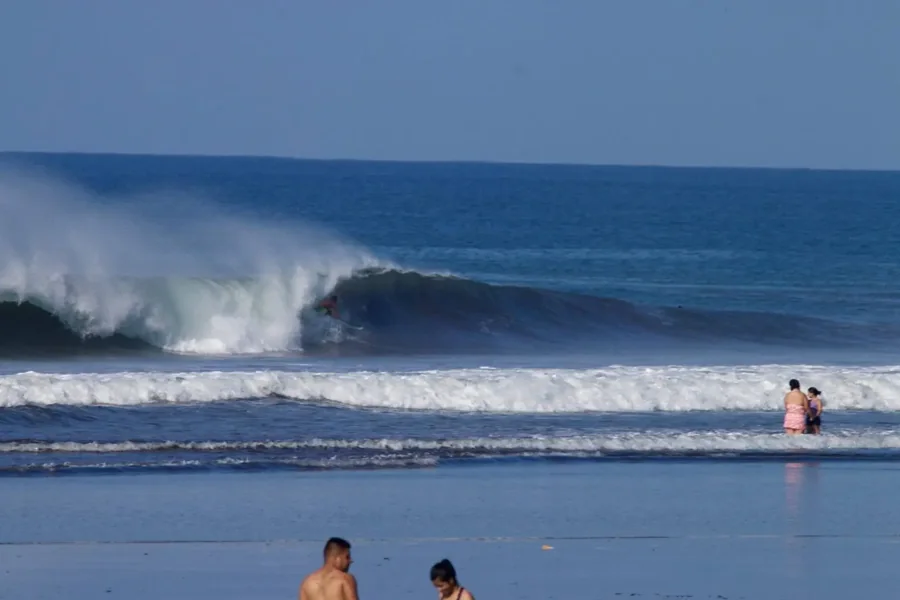 A wave breaking along the coast