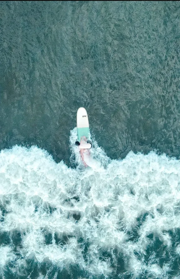 Following a surfer from above